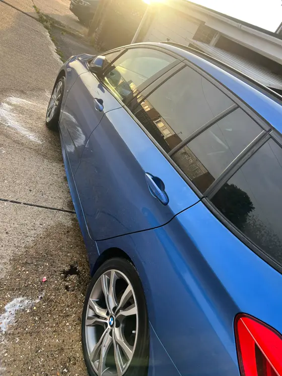 Blue BMW 2 Series with deep glossy paint after an exterior detail in Havant