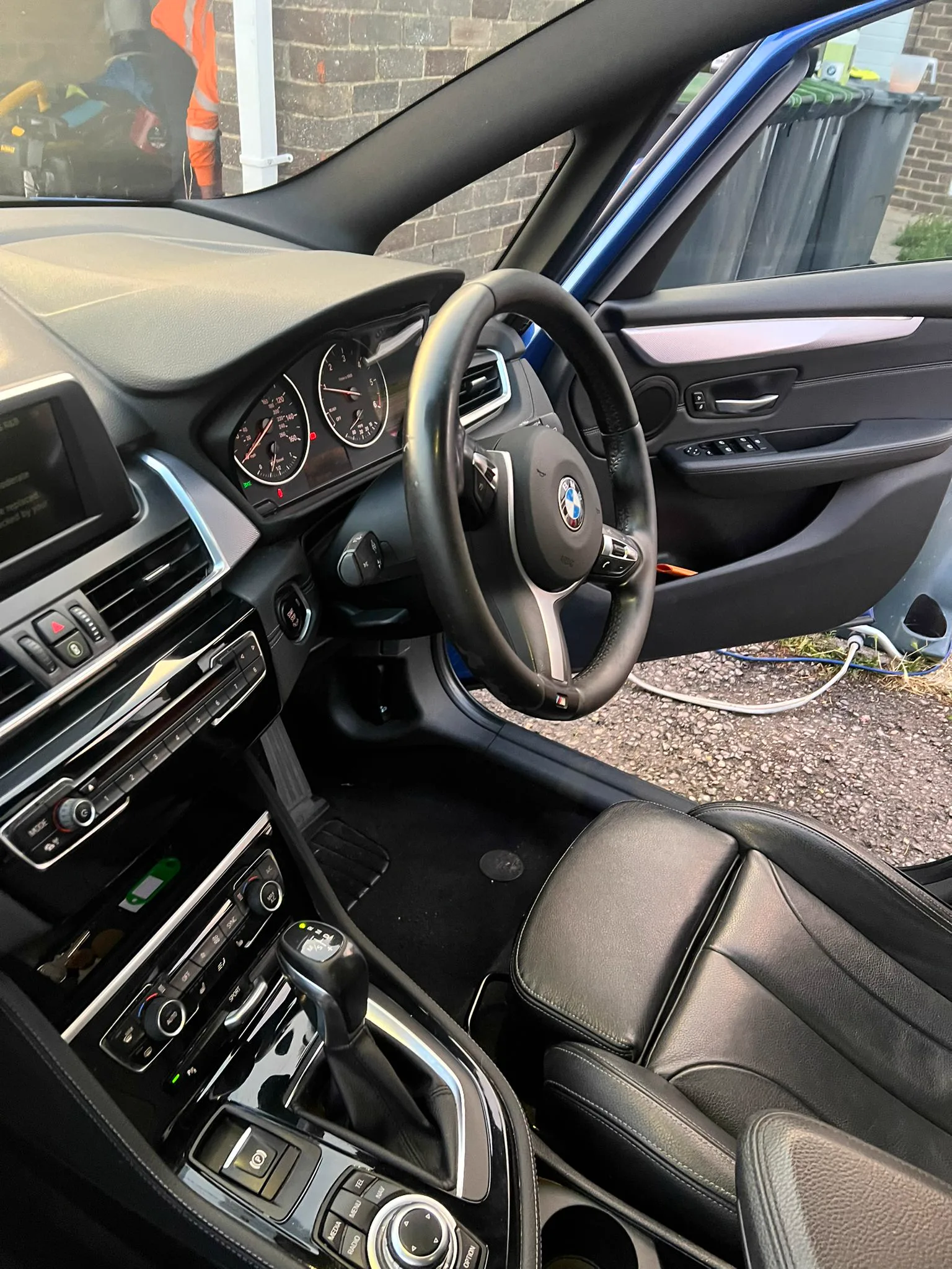BMW dashboard and console spotless after an interior detail near Waterlooville