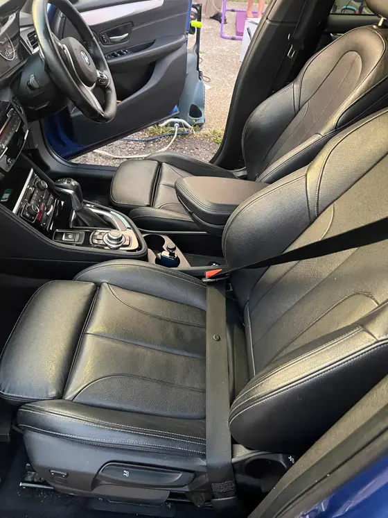 BMW front leather seats cleaned and conditioned, car detailing Hampshire