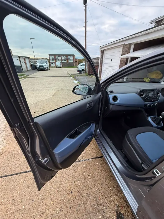 Hyundai i10 driver door open showing a spotless interior, Havant car valeting