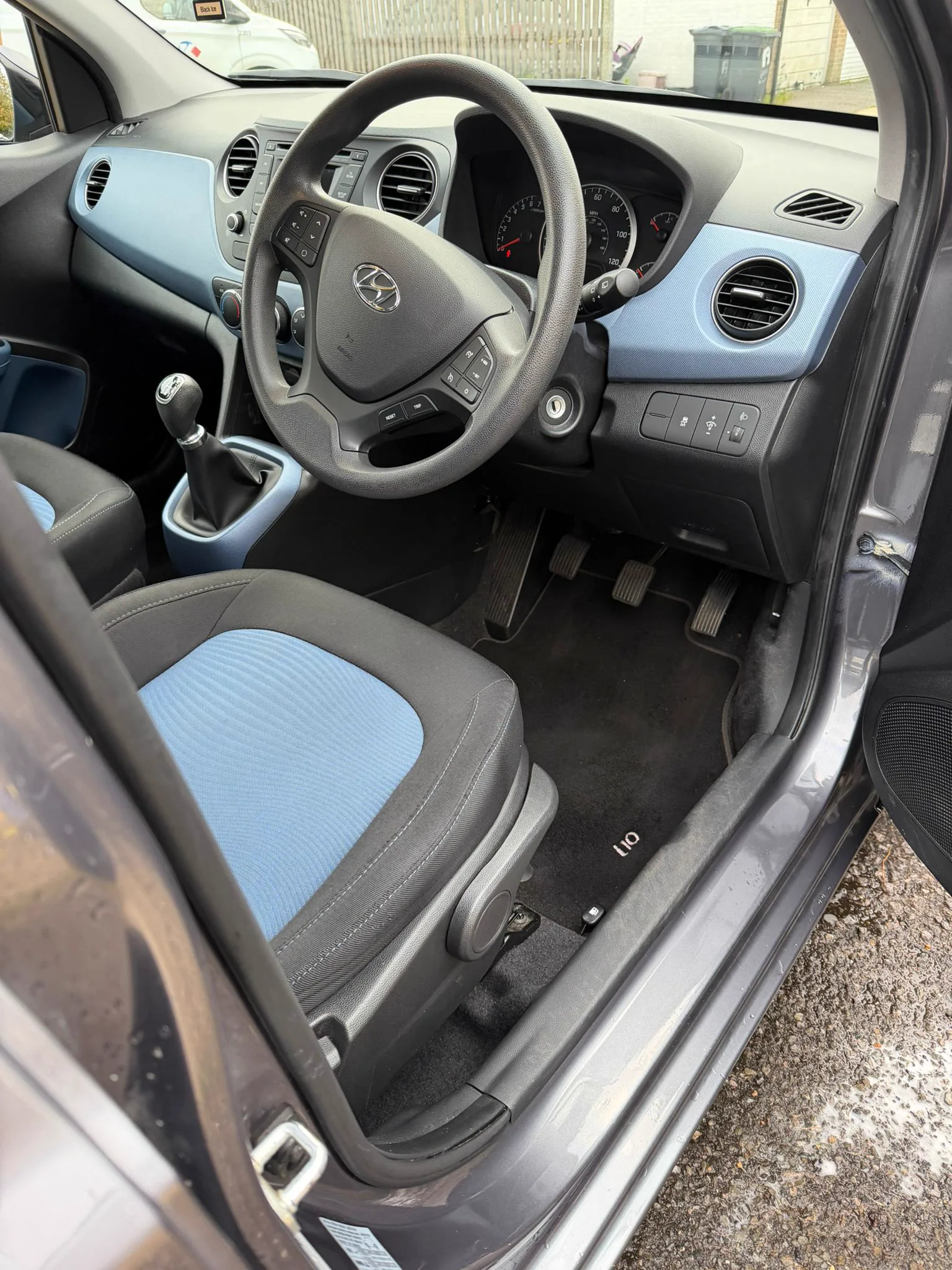 The same Hyundai i10 driver seat and footwell immaculate after a full valet
